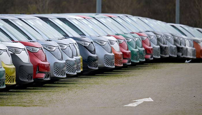 Volkswagen ID Buzz electric vehicles are lined up at the companys plant in Hanover, Germany, December 17, 2024. — Reuters