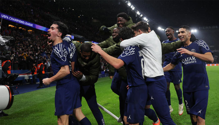Paris Saint-Germain players celebrate coming from behind to beat Manchester City in the Champions League on Wednesday. —AFP/File