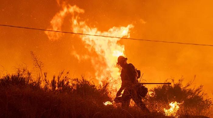 Mass evacuations after explosive new fire erupts near Los Angeles