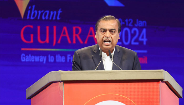 Chairman and managing director of Reliance Industries Mukesh Ambani speaks during the Vibrant Gujarat Global Summit, at the Mahatma Mandir in Gandhinagar, Gujarat, India January 10, 2024. — Reuters