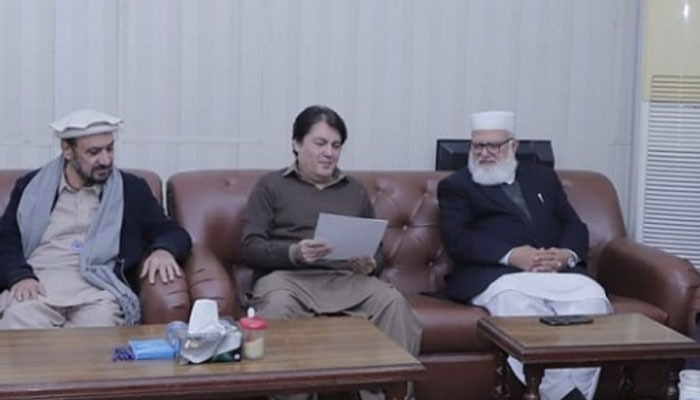 Advisor to the Chief Minister on Information and Public Relations Barrister Muhammad Ali Saif (centre) in a meeting with Jamaat-e-Islami leaders Liaqat Baloch (right) and Amir-ul-Azeem (left) at the JI headquarters in Mansoora on January 24, 2025. — Facebook@BarristerDrSaif