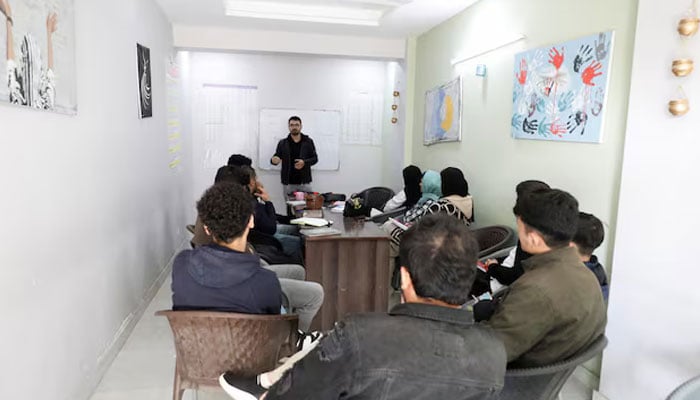 Afghan citizens, who are in the process for resettlement in the US attend English language class on the outskirts of Islamabad, Pakistan January 22, 2025. — Reuters