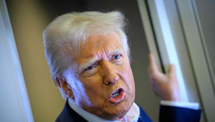 US President Donald Trump speaks with the press on board Air Force One after departing Las Vegas, Nevada, en route to Miami, Florida on January 25, 2025. — AFP/File