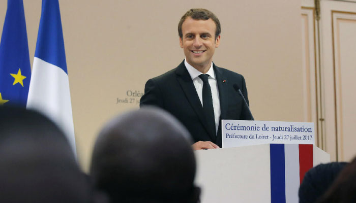 French President Emmanuel Macron delivers a speech during a citizenship ceremony in Orleans, central France, on July 27, 2017. — AFP