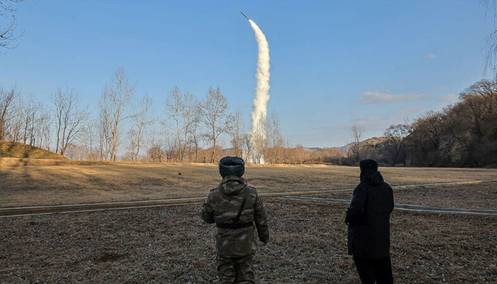 North Korean leader Kim Jong-un looks on during the test of what KCNA described as a strategic cruise missile, at an undisclosed location in North Korea in this photo released by KCNA on January 26. — Reuters