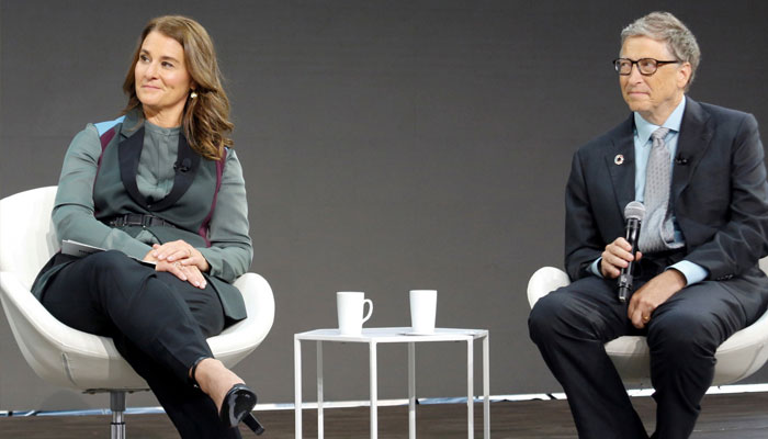 Bill Gates and Melinda Gates listen as former US President Barack Obama (not pictured) speaks at the Bill & Melinda Gates Foundation Goalkeepers event in Manhattan, New York, US, September 20, 2017. —Reuters