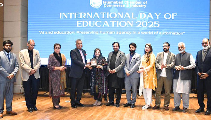 ICCI President Nasir Mansoor Qureshi (4th left) presents the Chamber shield to Parliamentary Secretary of Education and Professional Training Farah Naz Akbar (5th left) at a ceremony organised by the ICC to mark International Day of Education 2025 on January 27, 2025. — APP