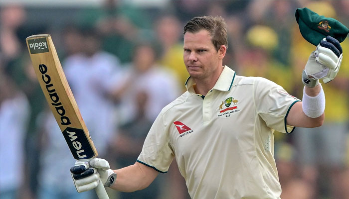 Australia´s captain Steve Smith celebrates after scoring a century (100 runs) during the first day of the first Test cricket match between Sri Lanka and Australia at the Galle International Cricket Stadium in Galle on January 29, 2025. — AFP