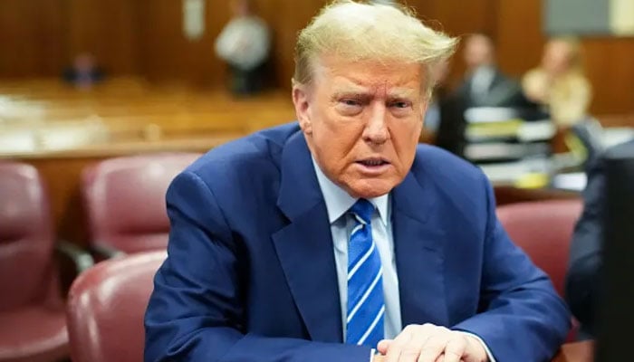 US President Donald Trump attends his trial for allegedly covering up hush money payments linked to extramarital affairs, at Manhattan Criminal Court in New York City on April 16, 2024. — AFP