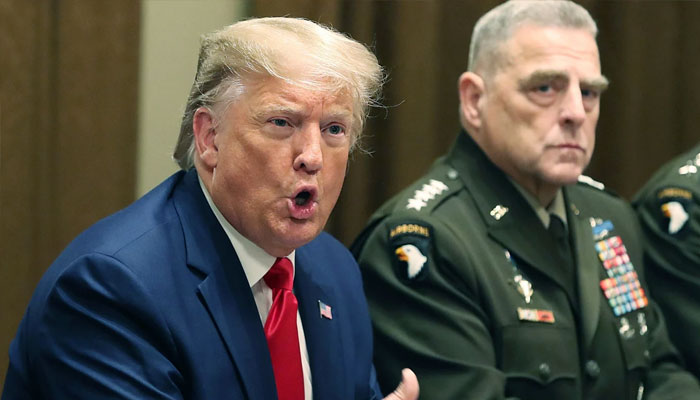 US President Donald Trump and former chairman of the Joint Chiefs of Staff Mark Milley.— AFP/File