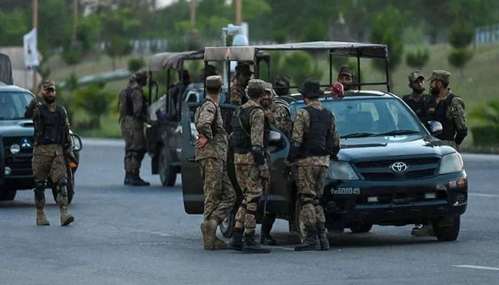 The representational image shows Army troops standing guard in the red zone in Islamabad on May 11, 2023. — AFP