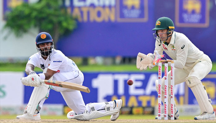 Sri Lankas Kusal Mendis (left) plays a shot during the third day of the first Test cricket match between Sri Lanka and Australia at the Galle International Cricket Stadium in Galle on January 31, 2025. — AFP