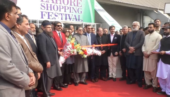 LCCI President Mian Abuzar Shad (7th right) in a group photo at the inauguration of the Lahore Shopping Festival at the Lahore Expo Centre on January 31, 2025. — Screengrab via Facebook@Ali Farooq Malik