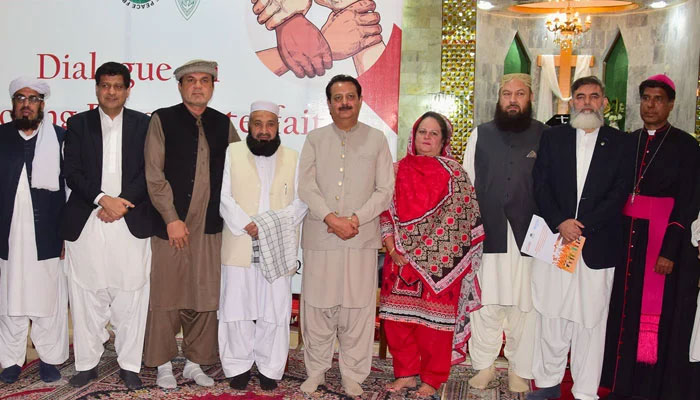 The representational image shows a group photo at the end of an interfaith harmony dialogue. — PPAF website