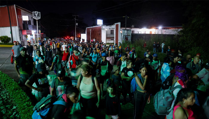 Migrants walk in a caravan after having rested on their way to the US border, in Huixtla, Mexico November 7, 2024. — Reuters