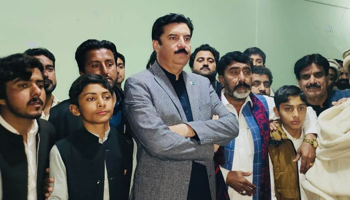 Governor Khyber Pakhtunkhwa Faisal Karim Kundi (centre) seen in this undated image.— Facebook@FaisalKarimKundi/File