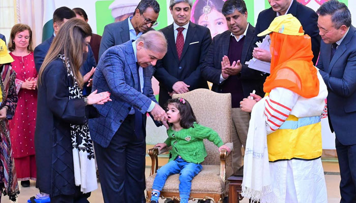 Prime Minister Muhammad Shehbaz Sharif administers polio vaccine to children at the inaugural ceremony of the National Polio Campaign 2025. — APP