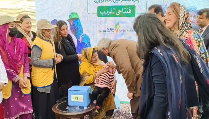 Punjab Health Minister Khawaja Salman Rafique (centre) administers polio vaccine drops to a child to inaugurate the first seven-day national polio eradication campaign of 2025 at Government Mozang Teaching Hospital on February 3, 2025. — Screengrab via Facebook@SalmanRafiquePK