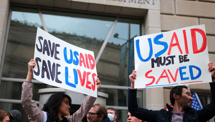 Protestors gather outside of USAID headquarters on February 03, 2025 in Washington, DC. Elon Musk, tech billionaire and head of the Department of Government Efficiency (DOGE), said in a social media post that he and U.S. President Donald Trump will shut down the foreign assistance agency. — AFP
