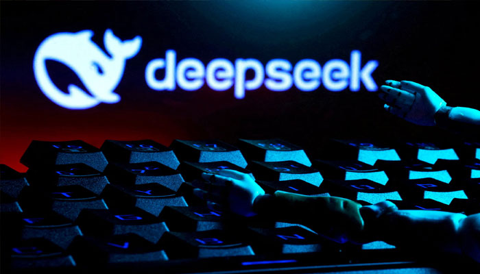 The DeepSeek logo, a keyboard, and robot hands are seen in this illustration taken January 27, 2025. —Reuters
