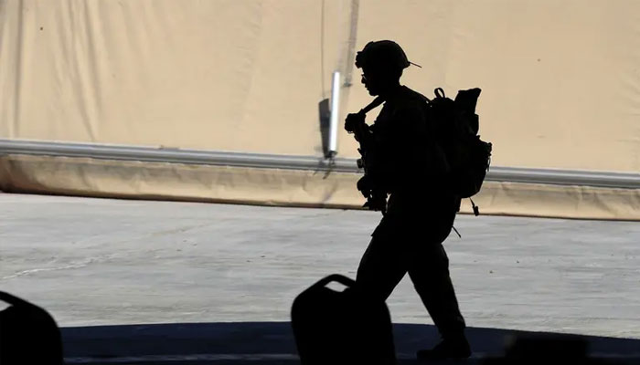 A US soldier is seen during a handover ceremony of Taji military base from US-led coalition troops to Iraqi security forces, in the base north of Baghdad, Iraq August 23, 2020. — Reuters