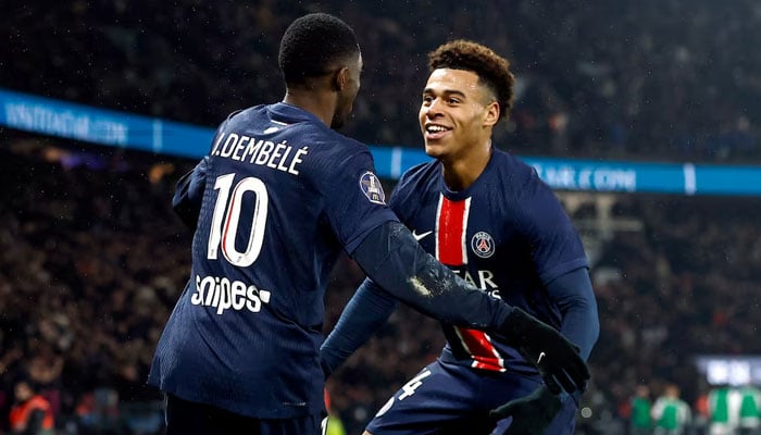 Paris St Germains Ousmane Dembele celebrates scoring their third goal with Desire Doue during a Ligue 1 match against AS Monaco at Parc des Princes, Paris, France on February 7, 2025. — Reuters