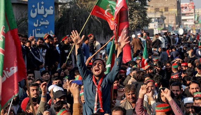 A PTI worker chants slogans amid a protest.— PPI/File