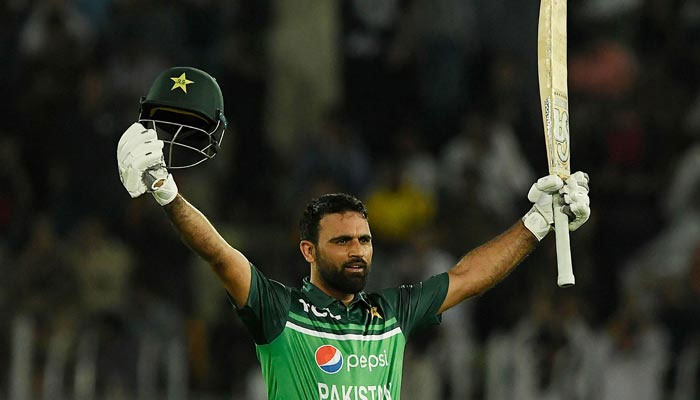 Pakistans Fakhar Zaman celebrates after scoring a century (100 runs) during the first ODI between Pakistan and New Zealand at the Rawalpindi Cricket Stadium in Rawalpindi, on April 27, 2023. — AFP
