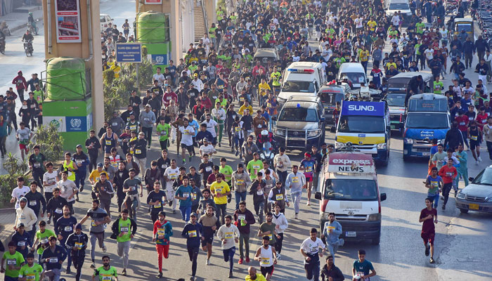 Runners participate during Chief Minister Punjabs first mini Marathon road race 2025, in Rawalpindi on February 9, 2025. — Online