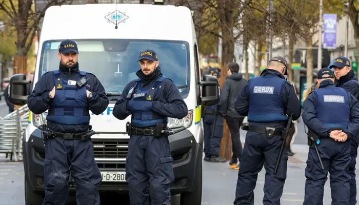 Irish Garda police officers stand on duty in Dublin. —AFP/File
