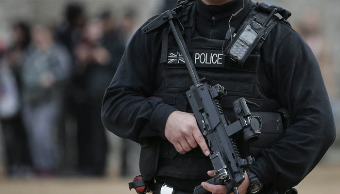A policeman stands alert in United Kingdom. — AFP/File