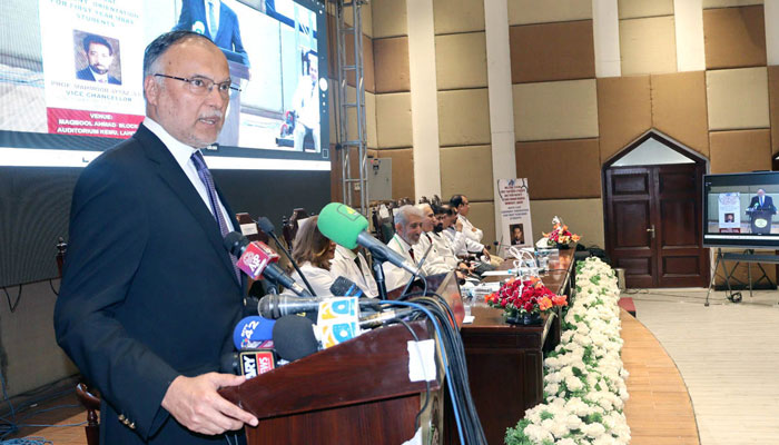 Federal Minister for Development Planning and Special Initiatives Prof Ahsan Iqbal  addresses the 165th White Coat Ceremony at King Edward Medical College on February 10, 2025. — APP