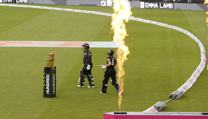 Two players moving towards pitch to play. — AFP/File