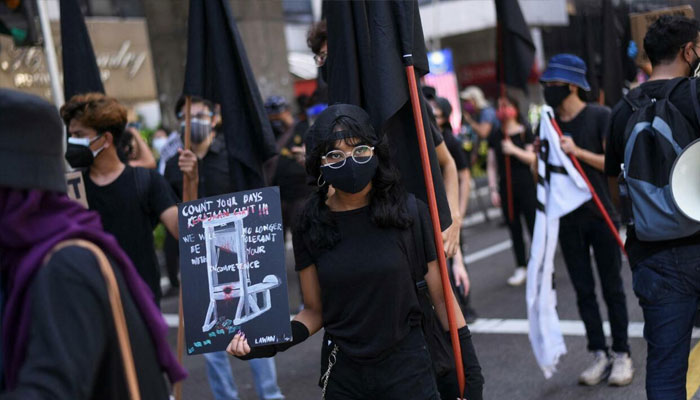 Malaysians take part in an anti-government rally in Kuala Lumpur on July 31, 2021. —AFP