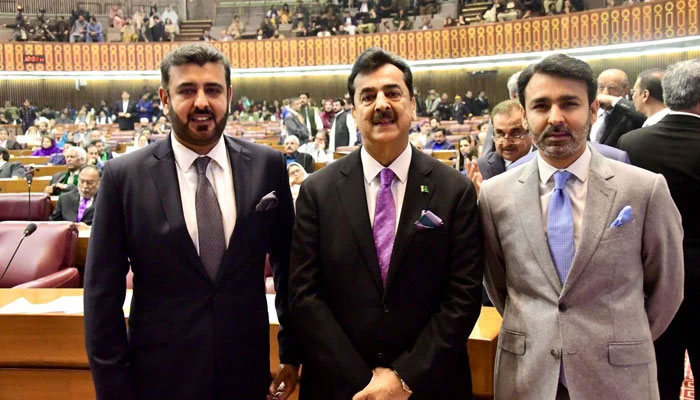 Senate Chairman Syed Yusuf Raza Gilani is seen along with his sons at the floor of the National Assembly. — X@Fiza_Gilani/File