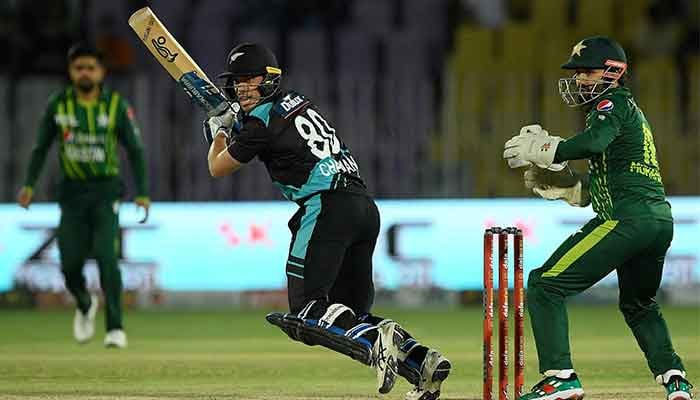 New Zealand´s Mark Chapman (centre) plays a shot during the fourth T20I cricket match between Pakistan and New Zealand at the Rawalpindi Cricket Stadium in Rawalpindi, on April 20, 2023. — AFP
