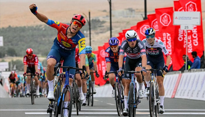 Italian rider Jonathan Milan punches his way to UAE Tour first stage success. —AFP/File