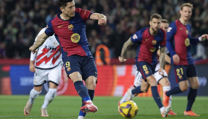 Robert Lewandowski scoring from the penalty spot. —AFP/File