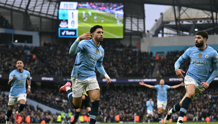 Omar Marmoush (centre) celebrating after scoring a hat-trick in Man Citys 4-0 win over Newcastle . —AFP/File