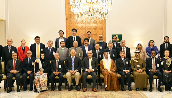 President Asif Ali Zardari in a group photo with the participants of the International Conference on Regional Connectivity & Pakistan: Emerging Opportunities, organised by the Pakistan-China Institute, at Aiwan-e-Sadr on February 18, 2025.— PID