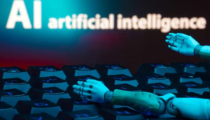 A message reading AI artificial intelligence, a keyboard, and robot hands are seen in this illustration taken January 27, 2025. — Reuters