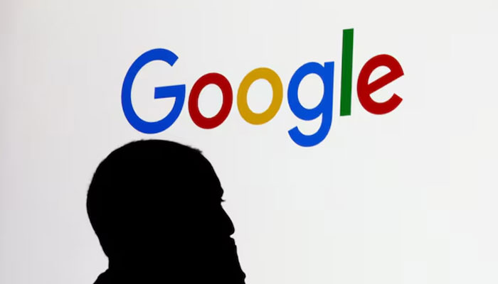 A man stands in front of a Google logo during a media reception at the Google France headquarters ahead of the Artificial Intelligence Action Summit in Paris, France, February 9, 2025.— Reuters
