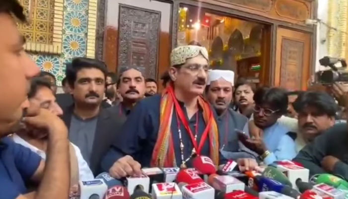 Sindh Chief Minister Syed Murad Ali Shah (centre) talks to the media during his visit to the shrine of Hazrat Lal Shahbaz Qalandar on February 19, 2025. — Screengrab via Facebook@SindhCMHouse