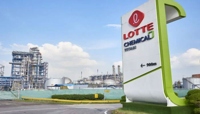 A signboard shows the directions to the Lotte Chemical Pakistan company. — LOTTE Chemical Titan Holding Berhad