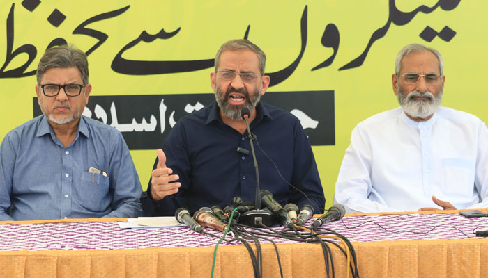 Karachi Jamaat-e-Islami (JI) Emir Monem Zafar (centre) addresses a press conference at the JI headquarters Idara Noor-e-Haq on February 20, 2025. — Facebook@Khijamaat