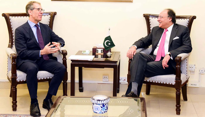 Federal Minister for Finance and Revenue Senator Muhammad Aurangzeb (right) exchanges views with IMFs Resident Chief Mahir Binici during a meeting at the Finance Division in Islamabad on December 5, 2024. — PPI