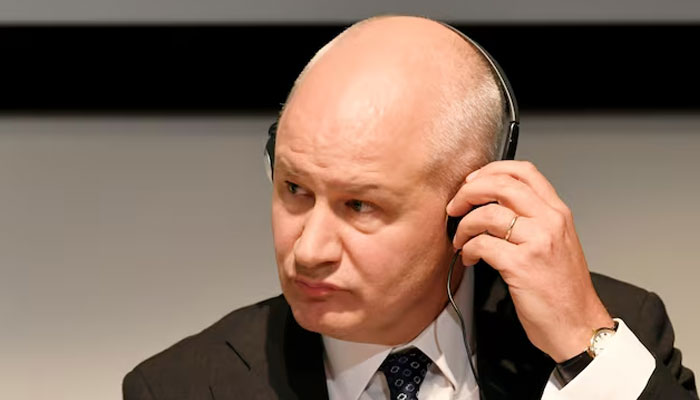 British Ambassador to the Netherlands Peter Wilson adjusts his headphones as he attends a news conference in The Hague, Netherlands, October 4, 2018.— Reuters