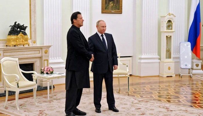 Russian President Vladimir Putin shakes hands with the then PM Imran Khan during a meeting in Moscow, Russia on February 24, 2022. — Kremlin