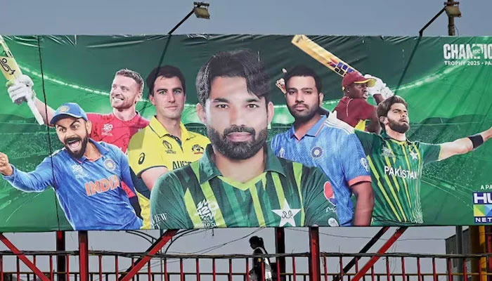 A billboard in Karachi depicting Indian stars Virat Kohli and Rohit Sharma ahead of Champions Trophy. —AFP/File