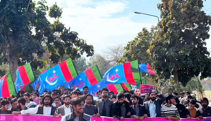 This still taken on February 14, 2025, shows Islami Jamiat Talaba (IJT) activists hold flags at a rally. — Facebook@IslamiJamiateTalabaPunjabUniversity